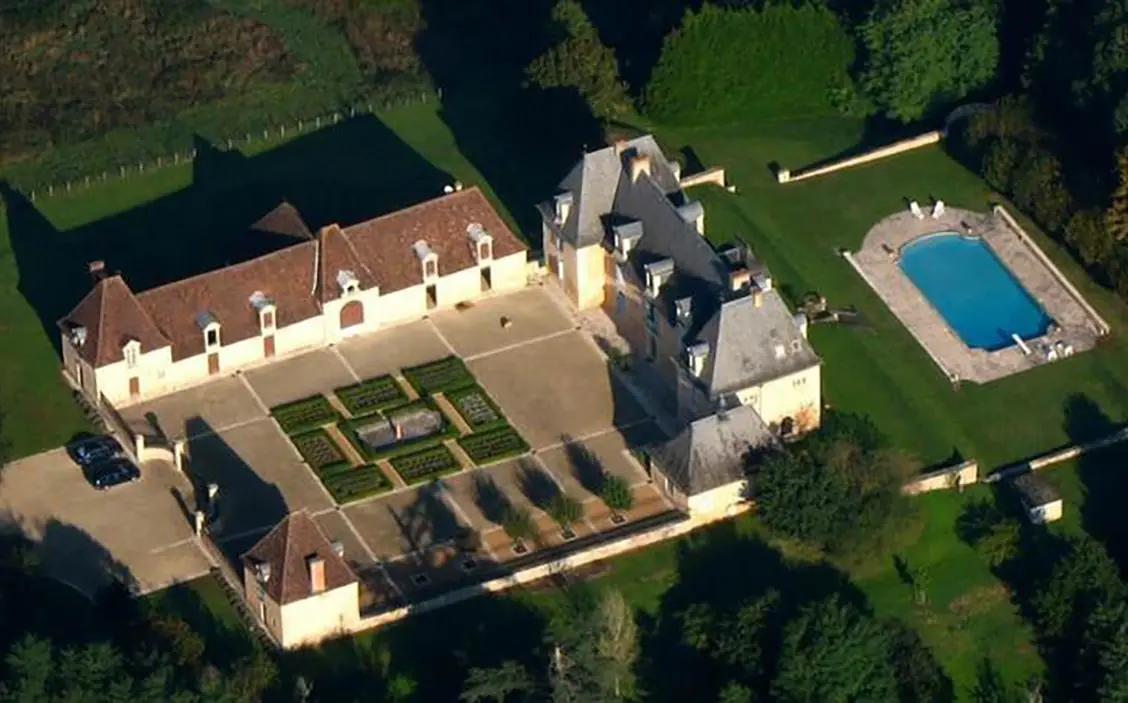 french chateau with gardens and pool