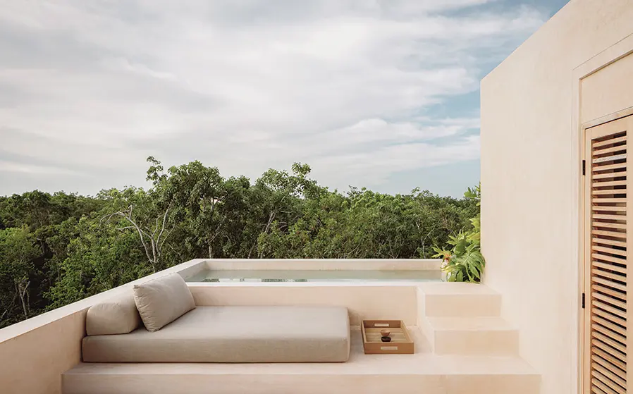 rooftop pool and lounge secluded with jungle views