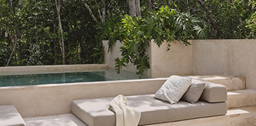 daybed next to pool terrace at candela